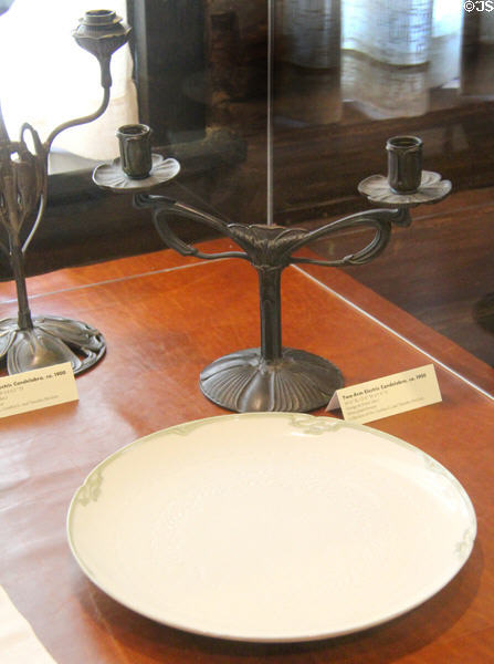 Two-arm electric candelabra (c1900) by George de Feure over 'Canton' China plate at Stickley Museum at Craftsman Farms. Morris Plains, NJ.