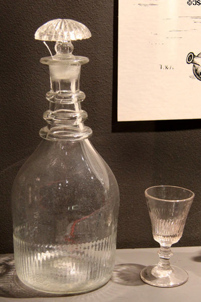 Glass American decanter (late 18th C or early 19thC) with wine glass (1820-30) possibly Boston & Sandwich Glass Co. at Museum of American Glass. Milville, NJ.