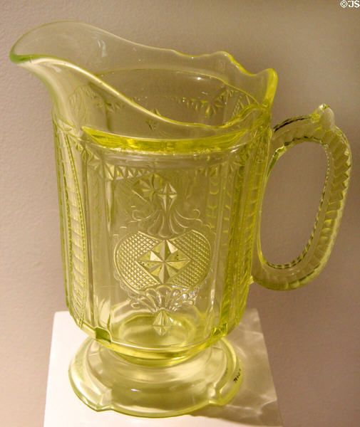 Vaseline or Uranium glass medallion water pitcher (1885-95) by unknown at Museum of American Glass. Milville, NJ.