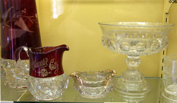 King's Crown glass vessels identified by circumference of round 'thumbprints' (c1890) by Adams & Co. of Pittsburgh, PA at Museum of American Glass. Milville, NJ.