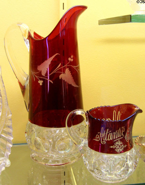 King's Crown glass pitchers with upper area ruby color (c1890-1905) by Adams & Co. of Pittsburgh, PA at Museum of American Glass. Milville, NJ.