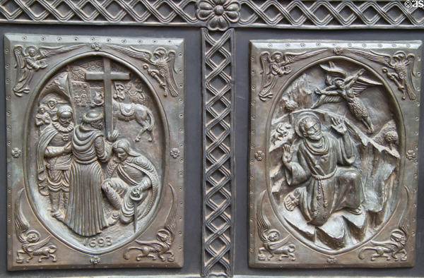 Expelled Spaniards returned (1693) & St Francis of Assisi church rebuilding starts (1714) on panels of St Francis Cathedral bronze door. Santa Fe, NM.