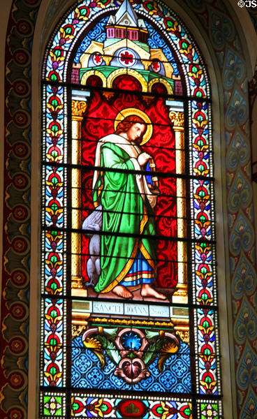 Evangelist St John with eagle stained glass window in St Francis Cathedral. Santa Fe, NM.