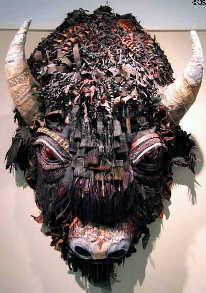 Buffalo head sculpted of various items (1992) by Holly Hughes in NM State Capitol Art Collection. Santa Fe, NM.