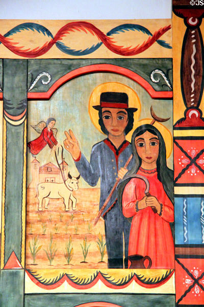 St Isidore & his wife by Irene Martinez-Yates on Reredos in Golondrinas Chapel at Rancho de las Golondrinas. Santa Fe, NM.