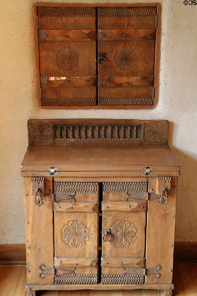 Carved shutters & cabinet by Nicolai Fechin at Taos Art Museum. Taos, NM.