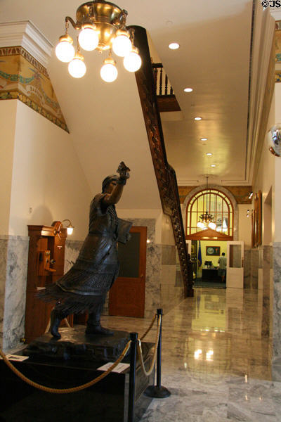 Interior hall of old Nevada State Capitol with Sarah Winnemucca (1844-1891) statue by Benjamin Victor. Carson City, NV.