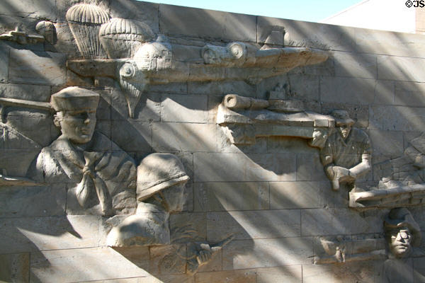 Carved relief of showing Teddy Roosevelt thru supersonic bomber on Nevada State Veterans' Memorial at State Capitol. Carson City, NV.