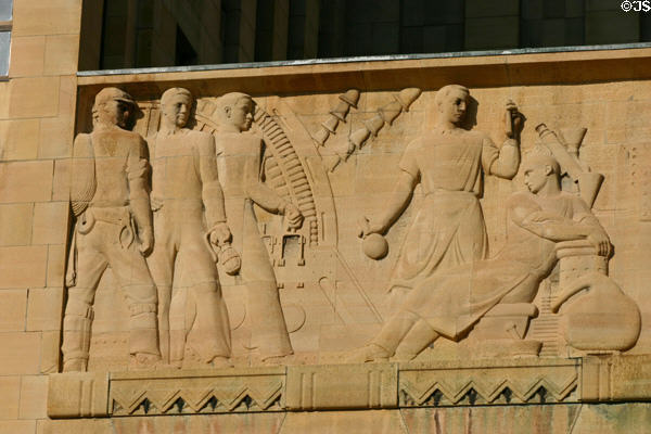 Section of relief on facade of City Hall showing the industries of electricity & chemistry. Buffalo, NY.