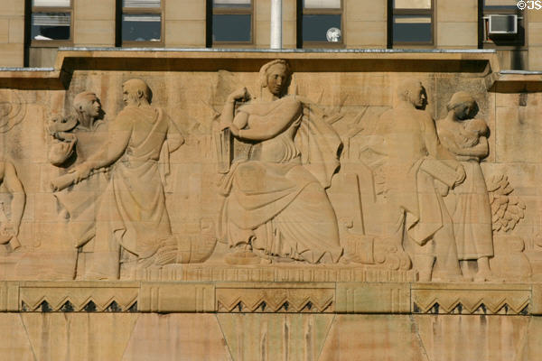 Section of relief on facade of City Hall representing knowledge & prosperity. Buffalo, NY.