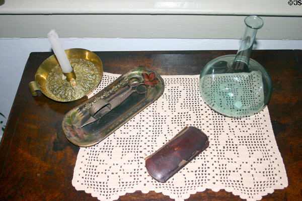 Wick scissors & objects on front room table of Millard Fillmore House. East Aurora, NY.