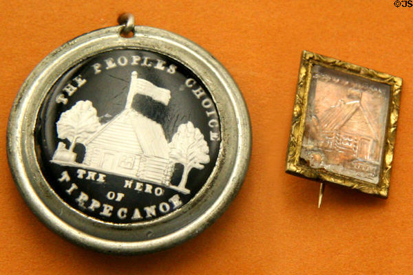 W.H. Harrison log cabin & The Peoples Choice, Hero of Tippecanoe campaign pins (1840) at Buffalo History Museum (BECHS). Buffalo, NY.
