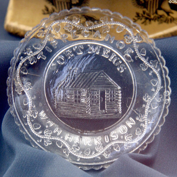 W.H. Harrison Tippecanoe Fort Meigs pressed Sandwich Glass cup plate with log cabin (c1840) at Buffalo History Museum (BECHS). Buffalo, NY.