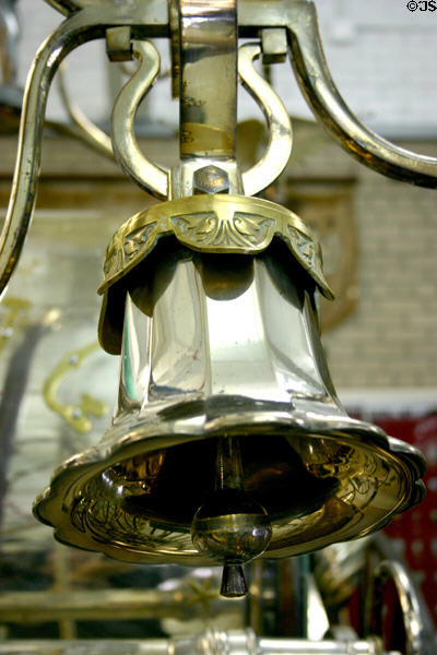 Detail of bell on Deluge parade carriage at FASNY Museum of Firefighting. Hudson, NY.