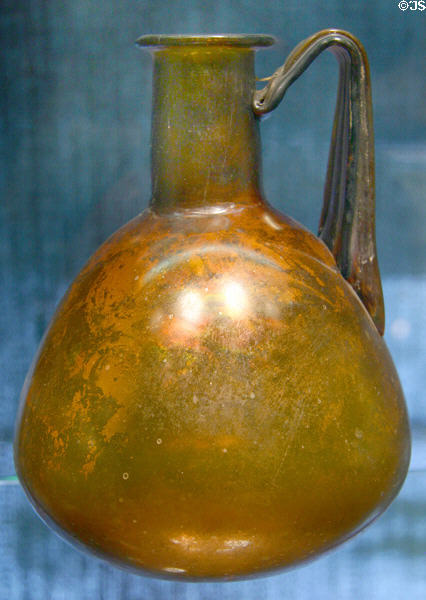 Blown glass pitcher (mid 1stC - early 2ndC) probably Roman empire at Corning Museum of Glass. Corning, NY.