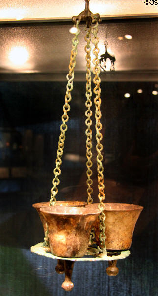 Eastern Mediterranean polycandelon with three lamps (6th C or later) at Corning Museum of Glass. Corning, NY.