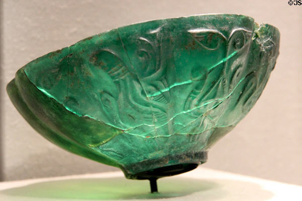 Islamic green glass bowl with figures (9th or 10thC) at Corning Museum of Glass. Corning, NY.