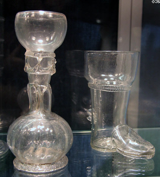 Germanic trick glass (17thC) & glass drinking boot (c1650-1700) at Corning Museum of Glass. Corning, NY.