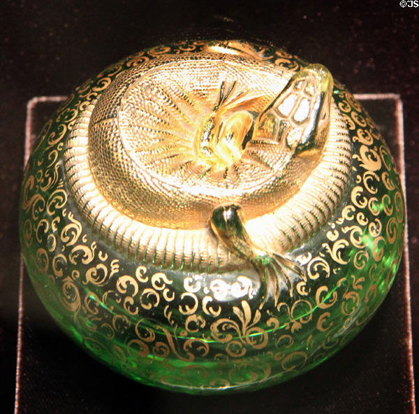 Glass paperweight with coiled lizard at Corning Museum of Glass. Corning, NY.