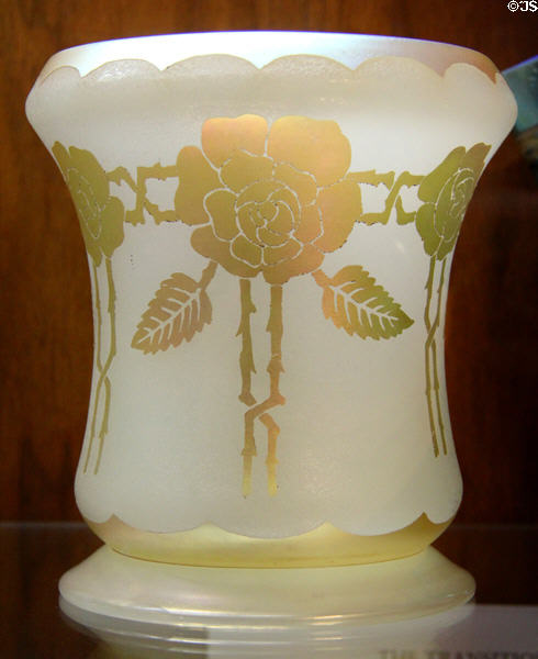 White glass vase with enameled gold roses (1930-40) by Frederick Carder for Steuben Glass at Corning Museum of Glass. Corning, NY.