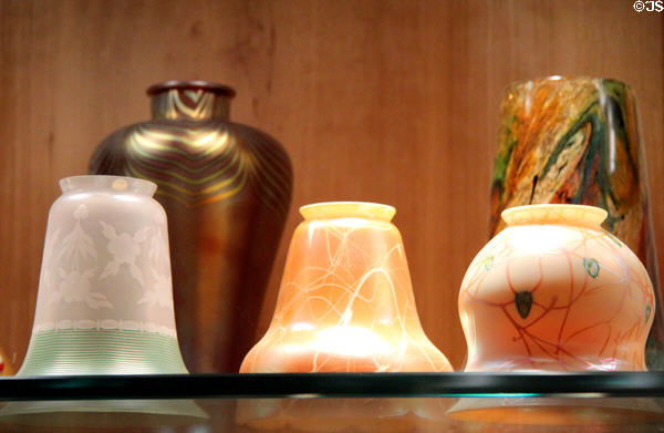 Single-bulb colored light shades (early 20thC) by Steuben Glass at Corning Museum of Glass. Corning, NY.