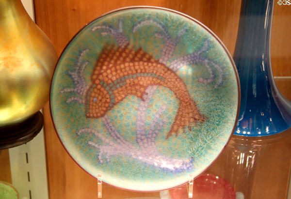 Custom mosaic glass plate with fish design (1920s) by Frederick Carder of Steuben Glass at Corning Museum of Glass. Corning, NY.