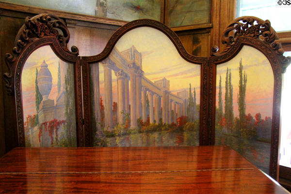 Roycroft paneled screen (1930) carved by Charles S. Hall with oil painting by Richard Kruger in lobby at Roycroft Inn. East Aurora, NY.