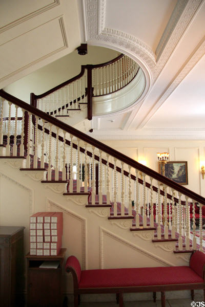 Freestanding mahogany front staircase at Eastman House. Rochester, NY.