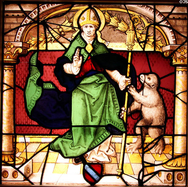 German stained-glass window (c1525) shows Bishop Saint with Bear at Memorial Art Gallery. Rochester, NY.