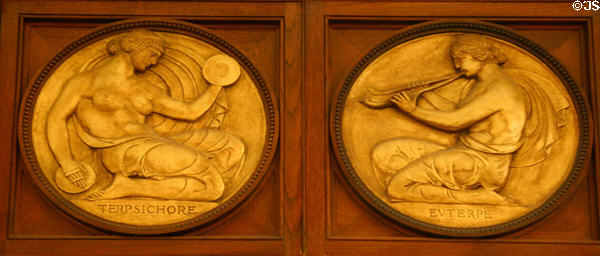 Relief roundels showing Terpsichore & Euterpe muses on Rush Rhees Library facade (1927) at University of Rochester. Rochester, NY.