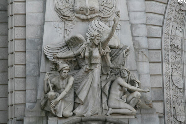 Detail of Spirit of Industry (1914) relief by Carl A. Heber on Manhattan Bridge Arch. New York, NY.