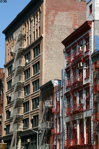 Streetscape of fire escapes along White Street. New York, NY.