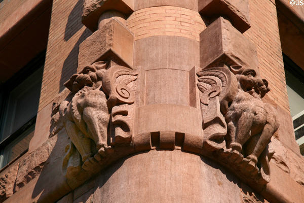 Carved gargoyles on 484 Broome St. New York, NY.