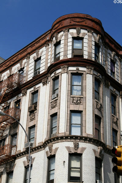 Building with rounded corner (390 Broome St. at Mulberry) in Soho. New York, NY.