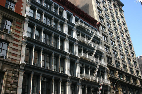 Iron-columned Italianate building (691 Broadway) beside Merchant's building (693 Broadway). New York, NY.