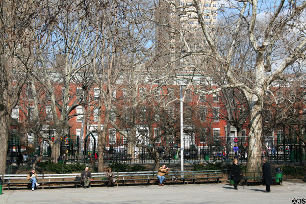 People sitting in Washington Square Park. New York, NY.