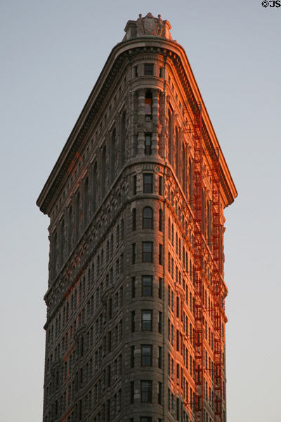 Flatiron (originally Fuller) Building (1901) (Fifth Ave. & Broadway). New York, NY. Style: Romanesque Revival. Architect: D.H. Burnham & Co.. On National Register.