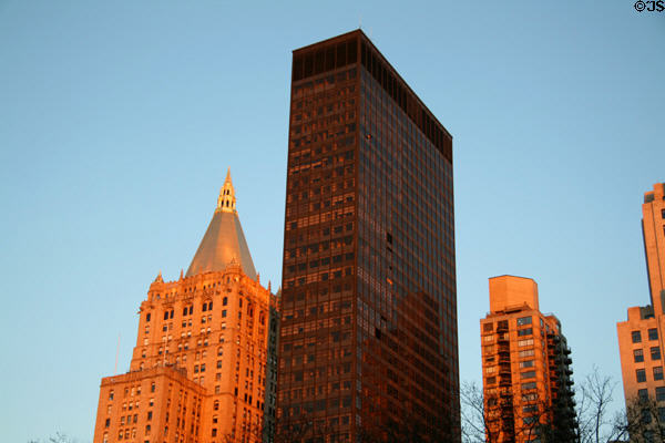 New York Life, Merchandise Mart Building (1974) (42 floors), & Stanford Apartments Buildings on Madison Square Park reflect sunset. New York, NY.