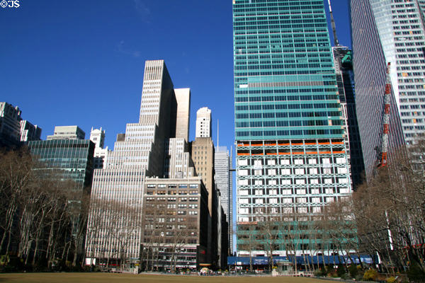 Towers along 6th Ave. over Bryant Park. New York, NY.