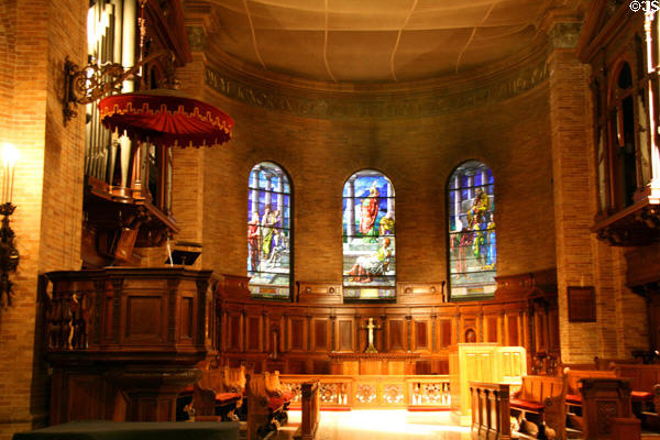 Interior of St. Paul's Chapel with stained glass by John La Farge at Columbia University. New York, NY.