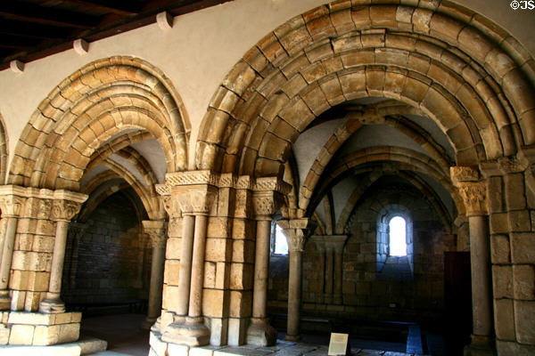 Abbey of Notre-Dame Pontaut Chapter House (12thC) with Romanesque doorway & Gothic interior arches from Gascony, France at The Cloisters. New York, NY.