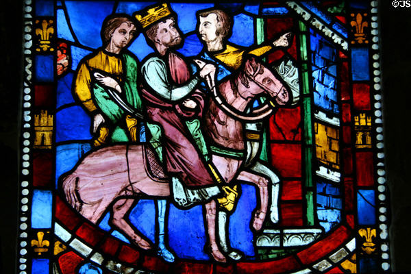 Stained glass (c1200) shows Theodosius arriving at Ephesus from legend of Seven Sleeping Christian Brothers from cathedral in Rouen, France at The Cloisters. New York, NY.