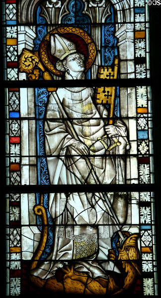 St Servatius, bishop of Tongres, crushing dragon of heresy stained glass (c1440) from the church at Boppard-am-Rhein at The Cloisters. New York, NY.