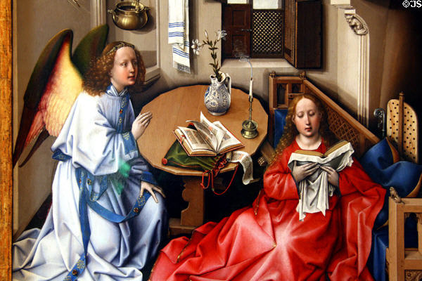 Detail of archangel Gabriel telling Virgin Mary she will be mother of Christ on Merode Altarpiece (1425-30) by Robert Campin from Tournai at The Cloisters. New York, NY.