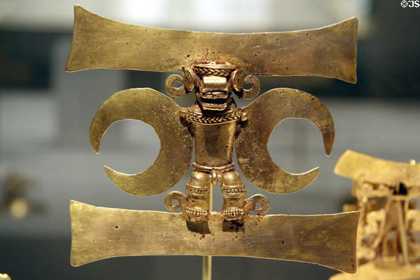 Cast gold masked figure pendant of Veraguas culture, Panama (12th-16thC) at Metropolitan Museum of Art. New York, NY.