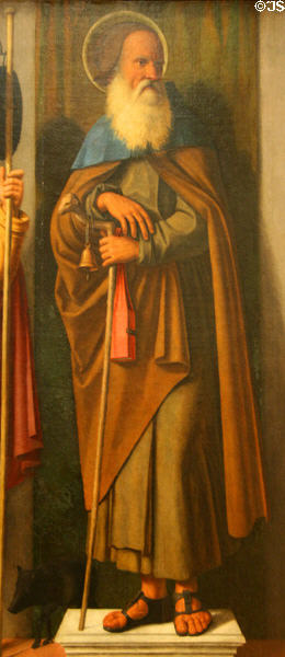 St Anthony Abbot carrying bell & with pig detail of Three Saints painting (c1513) by Giovanni Battista Cima at Metropolitan Museum of Art. New York, NY.