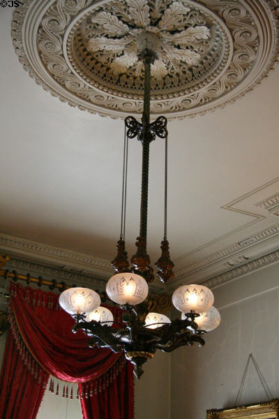 Lamp fixture & plaster work in living room ceiling of Old Merchant's House Museum. New York, NY.