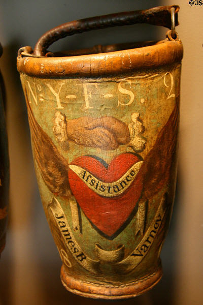 Painted leather fire bucket (early 19thC) with name of householder James B. Varney at New York Fire Museum. New York, NY.