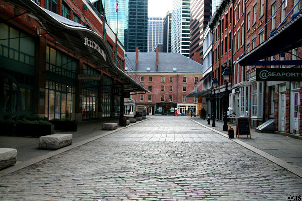 Front Street streetscape of South Street Seaport with Schermerhorn Row at end. New York, NY.