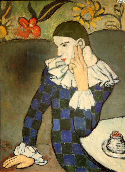Seated Harlequin painting (1901) by Pablo Picasso at Metropolitan Museum of Art. New York, NY.